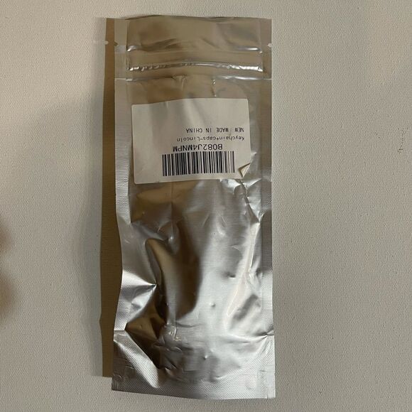 Lincoln keychain and valve Stem caps in Red NWT - Picture 5 of 5